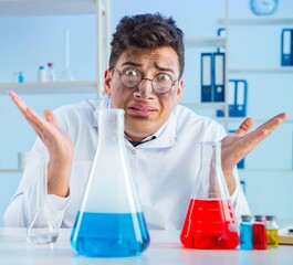 The funny mad chemist working in a laboratory