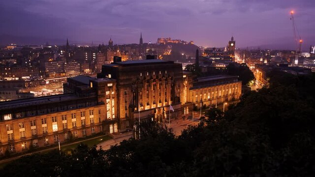 Night panorama of Edinburgh, Scotland, UK, featuring the Old Town, New Town, Edinburgh Castle and Scottish Government building