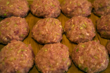 Raw minced meat balls, raw cutlets