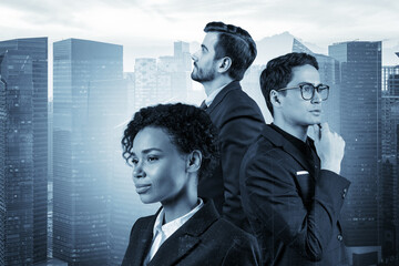 Three successful business consultants standing in a row in suits and ready to tackle with customer...