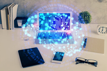 Double exposure of desktop with computer and brain drawing hologram. Artificial intelligence concept.