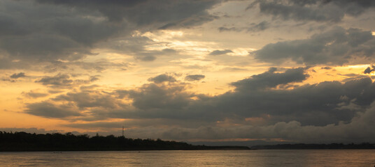 colorful dramatic sky with cloud at sunset