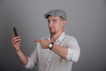 Naklejka premium Portrait Of Happy Young Man Talking On Cell Phone