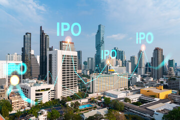 IPO icon hologram over panorama city view of Bangkok, the hub of initial public offering in Asia. The concept of exceeding business opportunities. Double exposure.