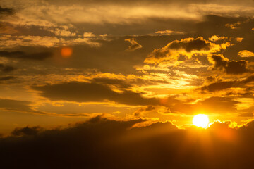 colorful dramatic sky with cloud at sunset