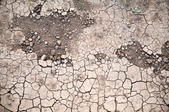 Closeup of broken dried out arid soil in Germany in September.