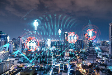 Glowing Social media icons on night panoramic city view of Bangkok, Asia. The concept of networking and establishing new connections between people and businesses. Double exposure.