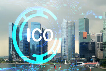 Hologram of glowing ICO icon, sunset panoramic city view of Singapore, startup incubator of cryptocurrency projects in Asia. The concept of affordable opportunities in new era. Double exposure.