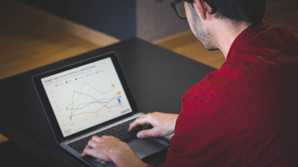 boy in front of computer working