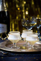 Festive black & gold desserts in glasses