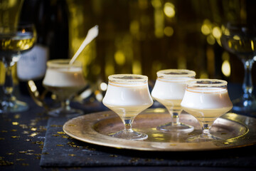 Festive black & gold desserts in glasses