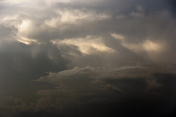 Fototapeta na wymiar White yacht on sea surface and storm clouds