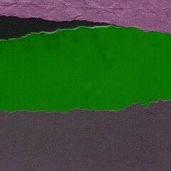 Colorful torn paper collage close-up. Texture made from various paper and cardboard parts. Damaged...