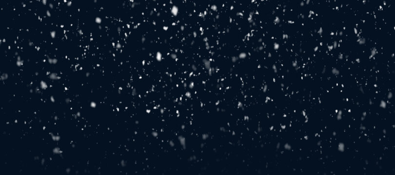 Heavy snowfall with real snowflakes.
Heavy snowfall with real snowflakes on black background. Illustration for winter scenes.