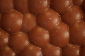 Airy bubble chocolate texture closeup