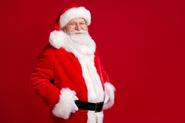 Turned photo of fairy holly crazy santa claus look in camera x-mas advent party touch belt wear red costume black belt isolated over bright shine color background