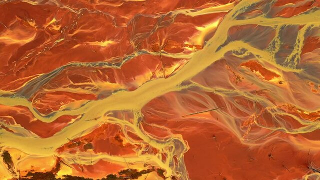 Acid river flowing from industrial copper zinc mine pollutes environment