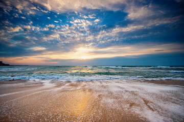 Dramatic cloudscape over the sea, sunrise shot