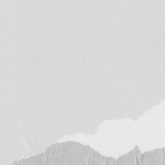 Obraz premium White torn paper collage close-up. Texture made from various paper and cardboard parts. Damaged old paper background. Vintage blank wallpaper. Material design backdrop.