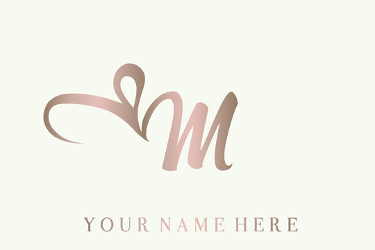 Letter m logo with ribbon heart shape.Romantic, feminine style.Calligraphic lettering icon in rose gold color isolated on light background.Script lowercase alphabet initial shape with love sign.
