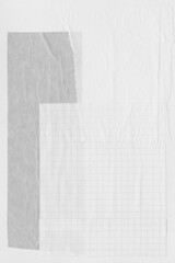 White torn paper collage close-up. Texture made from various paper and cardboard parts. Damaged old paper background. Vintage blank wallpaper. Material design backdrop.