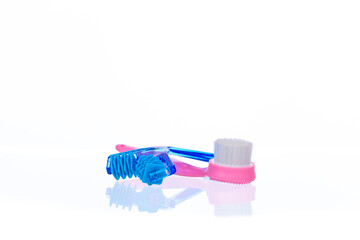 plastic roller massager and soft bristle brush to stimulate skin blood. Set for stimulating infants...