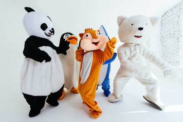 Group of animals mascots doing party