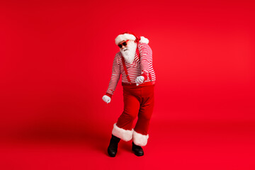 Full length body size view of his he nice handsome attractive thick cheery childish Santa dancing rest occasion x-mas isolated bright vivid shine vibrant red color background