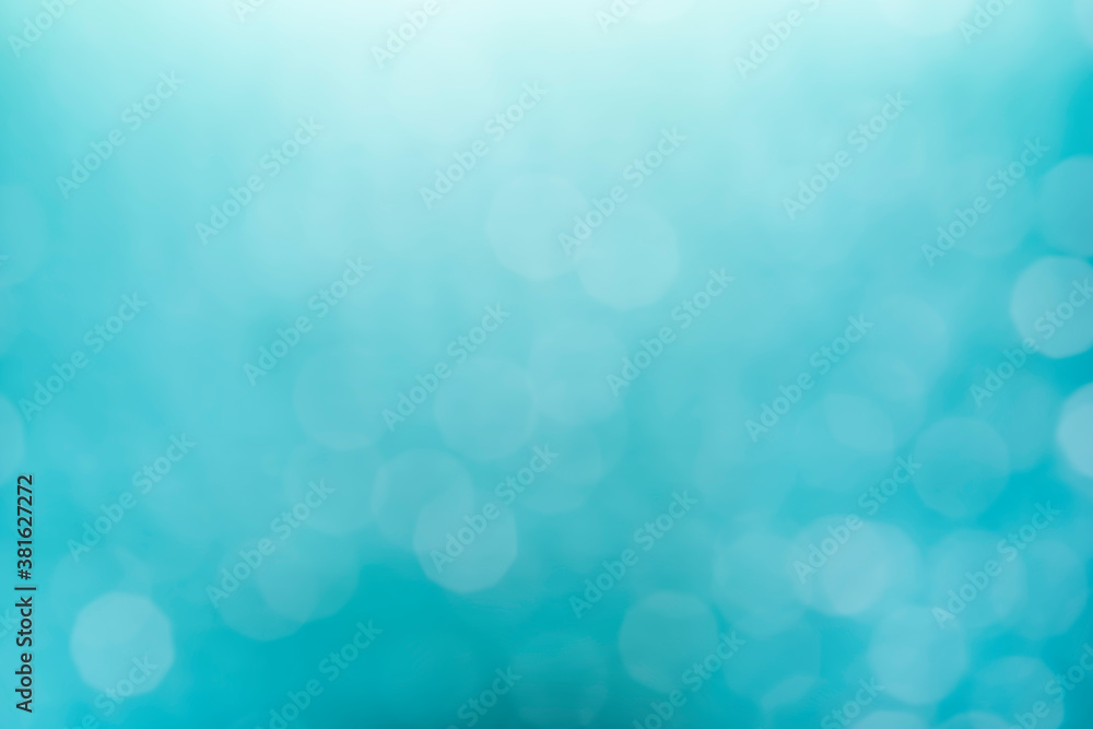 Poster bokeh light on blue background, sky with circle glitter light blur. abstract soft glowing snow with 