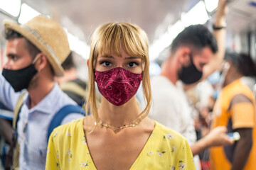 Image with a passenger on the metro commuter during pandemic events in 2020