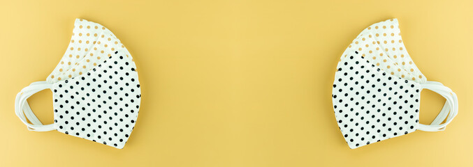 Dot Cotton Mask face on cream background,Banner panorama,Coronavirus, New normal concept.