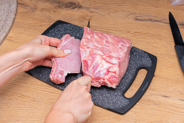 Raw and juicy meat on chopping board