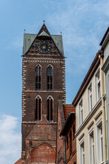 Fototapeta na wymiar Tower of St Mary Church in historic centre of Wismar