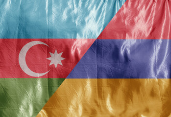 Flags of armenia and azerbaijan on textile background