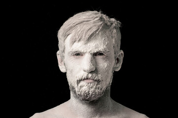 portrait of a guy in white powder