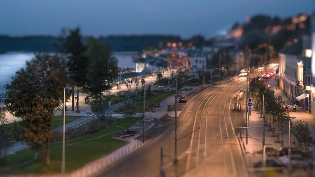 4k Long exposure time lapse video with tilt shift effect. Fast moving cars on the road at a evening time. Belgrade, Serbia.