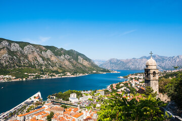 Panoramic view from of Kotor old town and church tower. Kotor bay in Montenegro. Balkans, Adriatic sea, Europe.