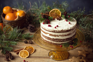 Rustic naked Christmas cake with decoration