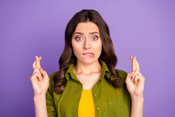 Close-up portrait of her she nice attractive lovely pretty cute worried brown-haired girl waiting news crossed fingers isolated over bright vivid shine vibrant lilac violet purple color background