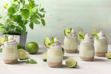 Obraz na płótnie Canvas Summer green lime desserts in jars
