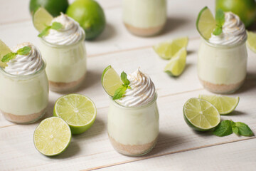 Obraz na płótnie Canvas Summer green lime desserts in jars