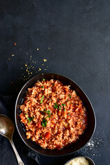 Traditional italian tomato sauce bolognese with minced meat. Top view with copy space.