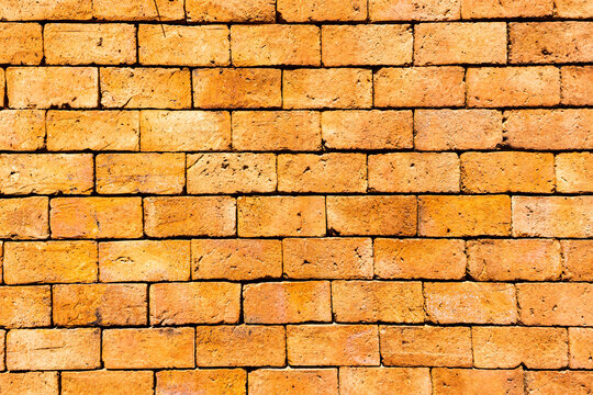 Orange brick wall with copy space Royalty high-quality free stock photo image of blank, empty background for texture