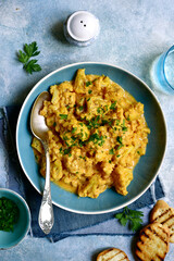 Vegan cauliflower curry. Top view with copy space.