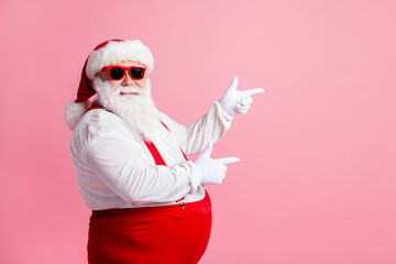 Profile side photo of funny fat overweight santa claus point index finger copyspace x-mas adverts...