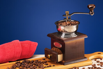 old mechanical wooden coffee grinder works great today