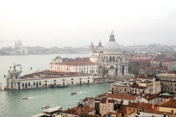 Fototapeta na wymiar Panorama with the red roofs, Adriatic sea and the most impressive historical buildings of the old romantic Venice, Italy