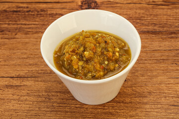 Green spicy sauce in the bowl