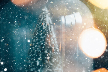 Christmas tree in a jar with snow. Holiday background themed image. 