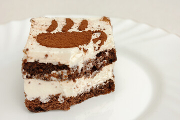 Bitten piece of cake, side view, close-up